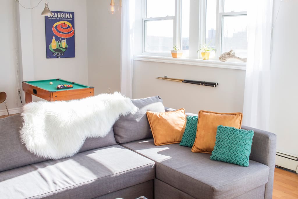 The large Ikea sectional sofa folds out into a comfy queen size bed - sleeps 2.