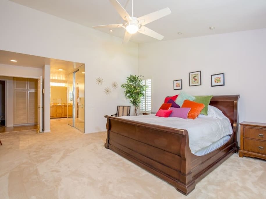 Master Bedroom Suite: Walk in Closet, King size bed, soft plush carpet, work desk area, large wall mounted TV, connected Bathroom with large soaking tub, separate shower, very spacious! Located on the First floor