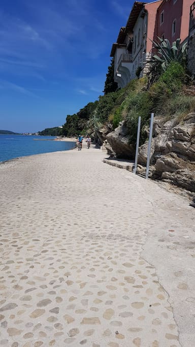 a beautiful promenade to the first beach where you can refresh yourself and drink some fine coffe
