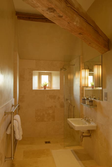 Italian Room's en suite shower room, accessible for wheel chair users as well.