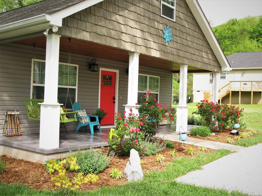 Pull up a chair and relax on this big front porch.