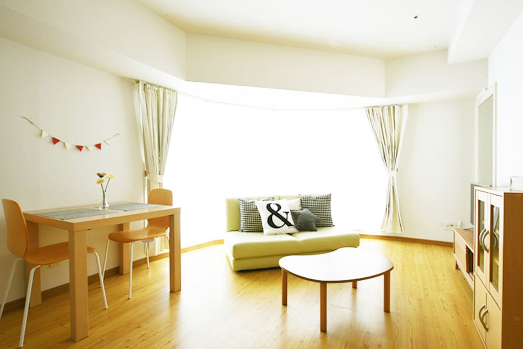 Living room - dining table and semi double sized sofa beds