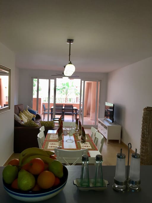 View from the kitchen into dining, living room & terrace