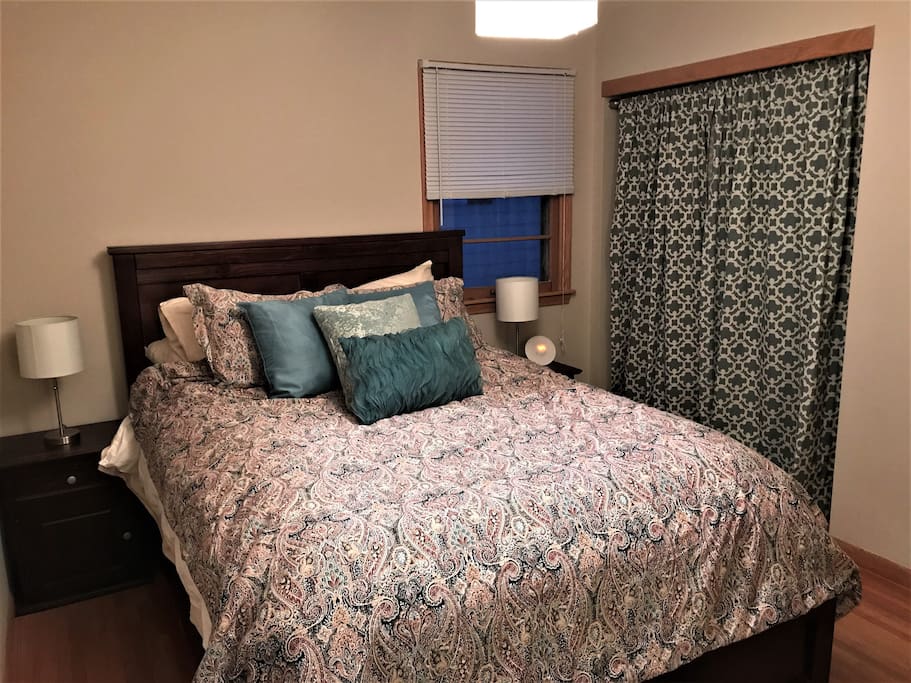 Master bedroom with a queen bed