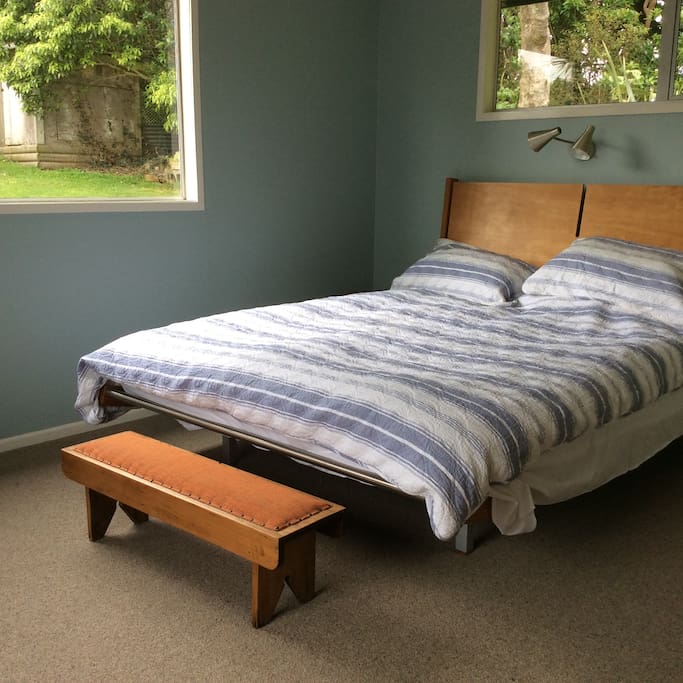 Guest bedroom 1 (1similar adjoining) opens to guest deck