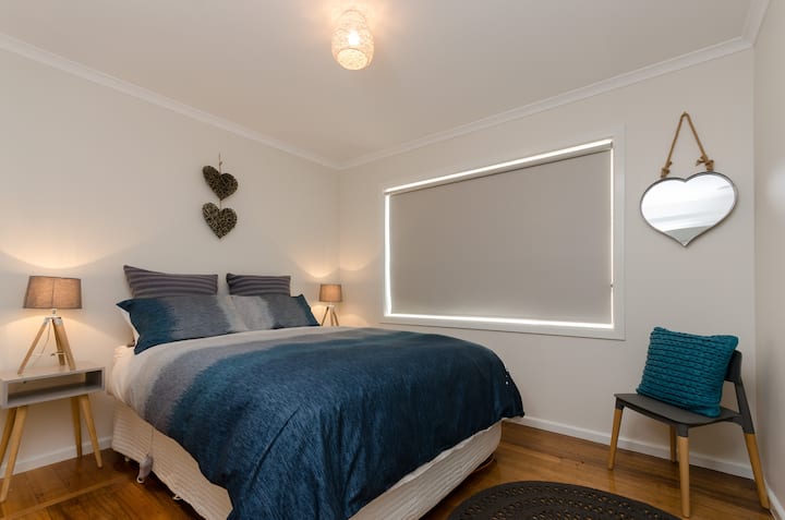 Luxury queen ensemble with built-in robe and separate ensuite