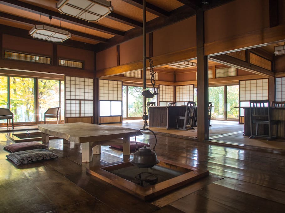 Main space in 1st floor; ancient style dinning, irori, tables and engawa.