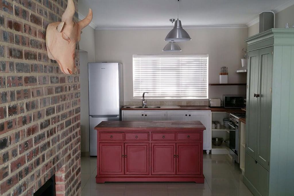 Well equipped kitchen with under counter dishwasher, Nespresso machine, large fridge freezer, microwave and toaster.