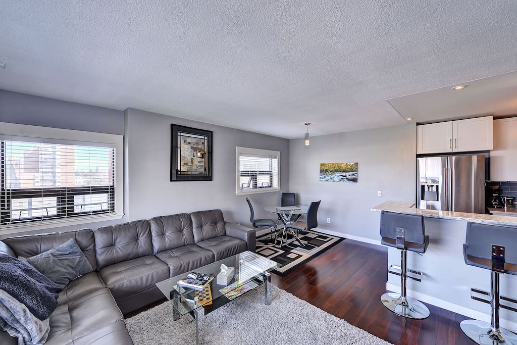 Spacious open concept living and dining area, with sit up bar