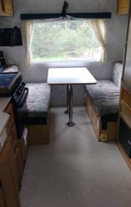 Dining area, table fold down for a second bed