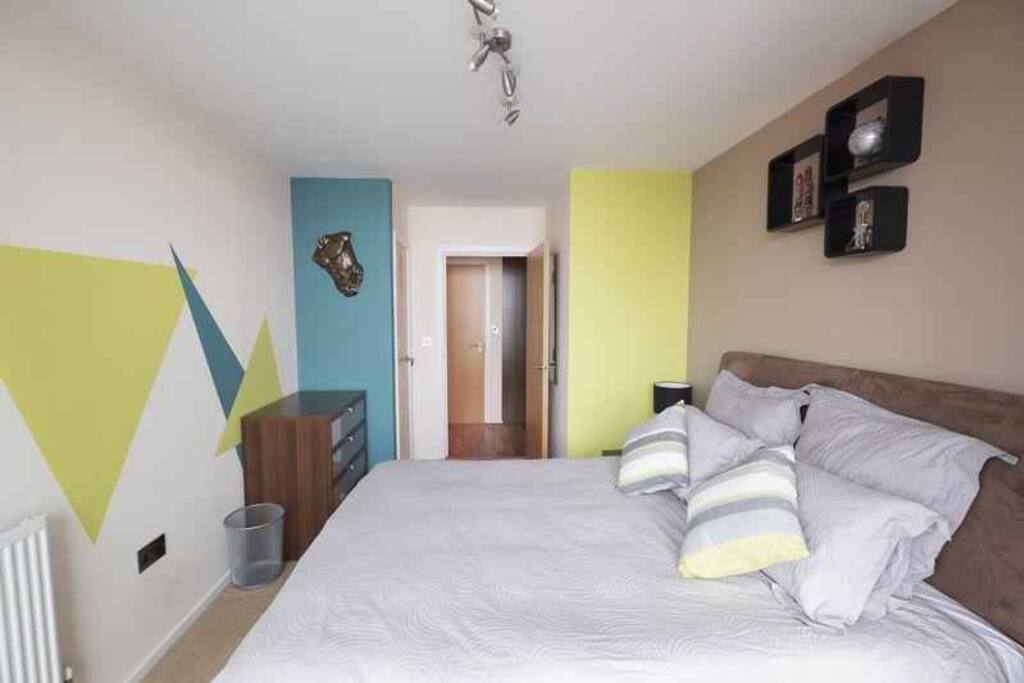 King size bed with quality bedding in your bedroom