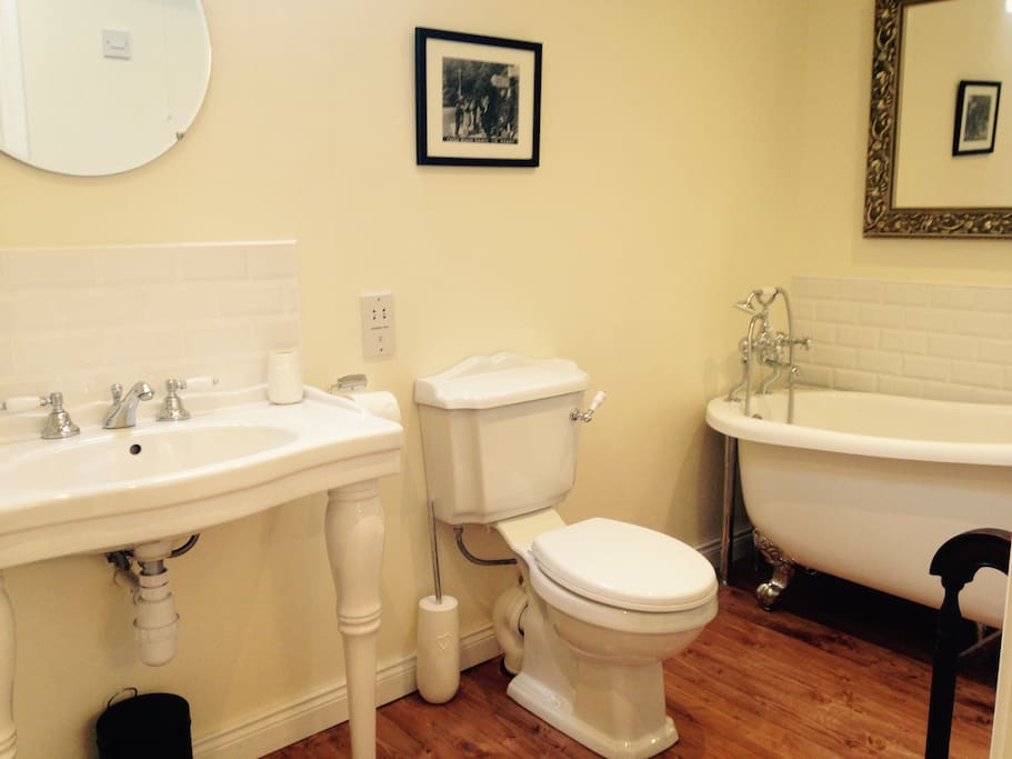 The bathroom is traditional and elegant