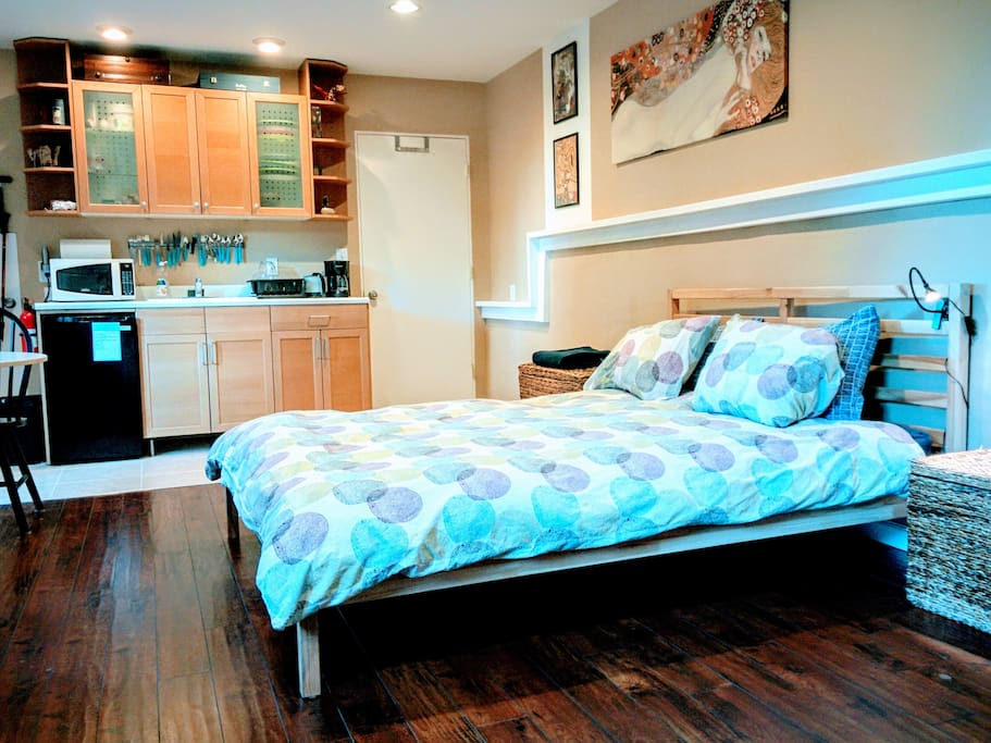 Queen bed and kitchenette