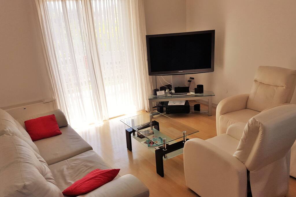 Living room with TV set.