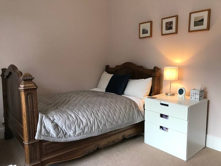 Holywell Room has a beautiful French antique small double bed (4 ft wide) suitable for one adult or two children and a single bed