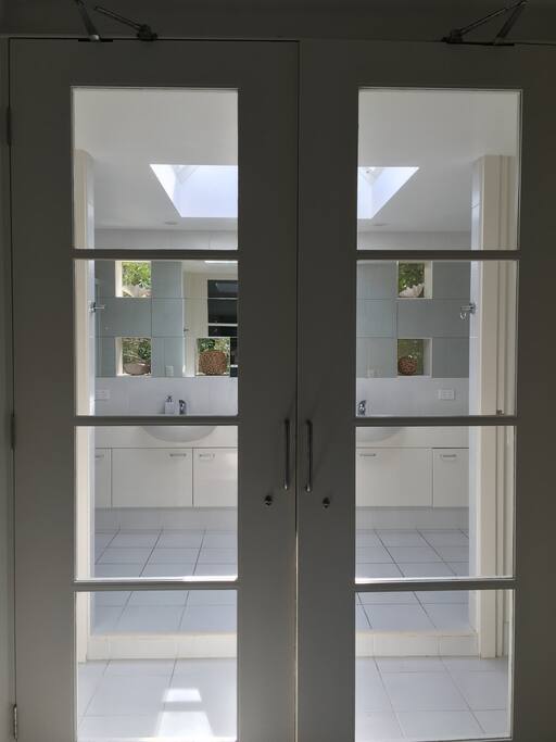 Entrance to vast bathroom
