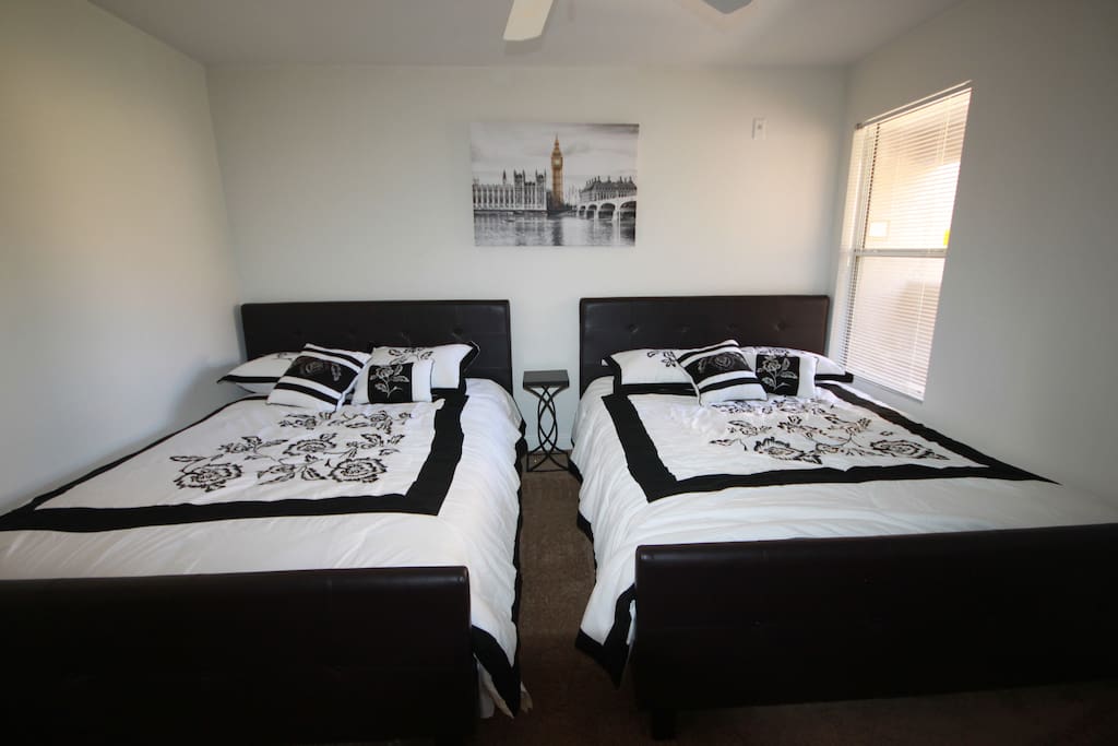 Master bedroom with x2 queen beds