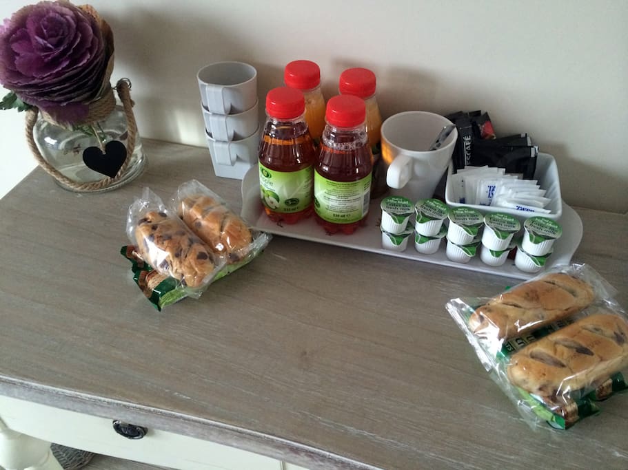 complimentary breakfast of fruit juice, brioche, breakfast cereal bar, tea and coffee.