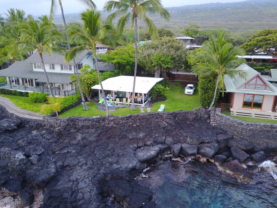 Aerial photo of Kale's Lagoon & little Hale Iki tucked between the neighbors on Alii Drive
