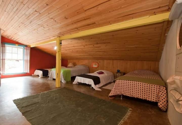 The big bedroom on the second floor, attic, which we call "Rocco and Sui Fraternos " sums up the Charming Cozy House for vacation with the class or with the kids 