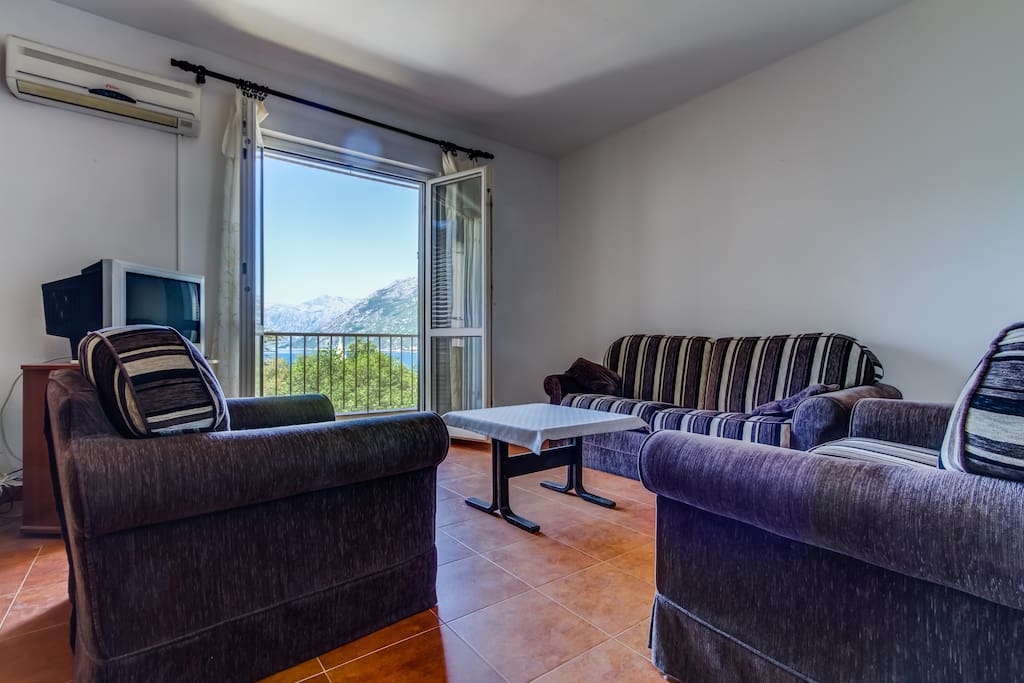 Living room and sitting area with sea view