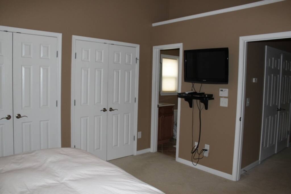 Master Bedroom - King bed, Dual organized closet space with drawers 32" TV/DVD player on 3rd floor
