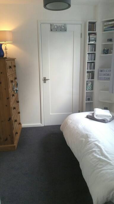 The bedroom - with storage and shelves