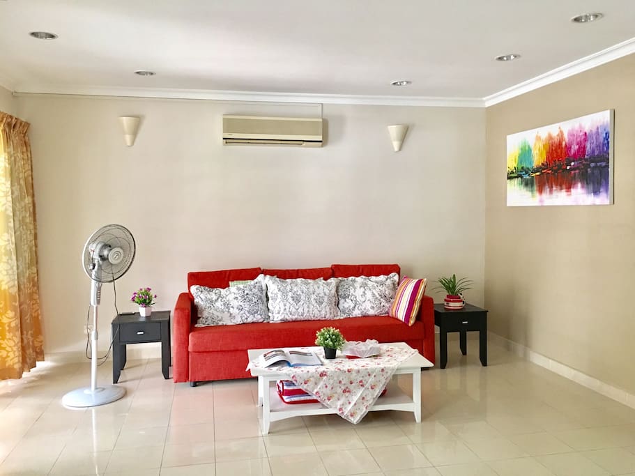 Air Conditioned living room with Unify, TV and Hypp TV , DVD player and dozens of DVD to entertain guests