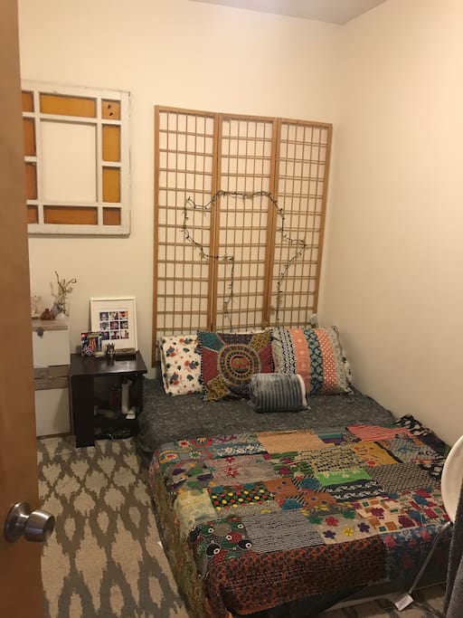 Comfy bedroom with an artistic flair