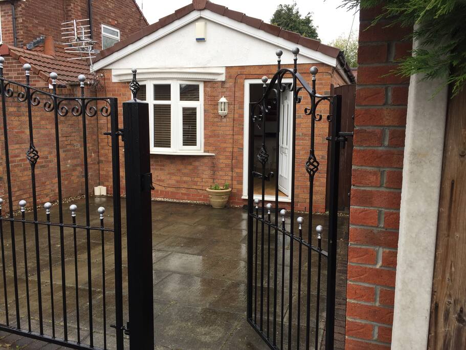 Entrance to bungalow with secure gate