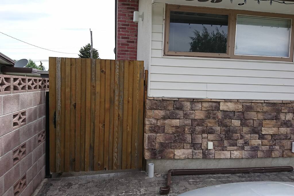 Left side gate into back yard.