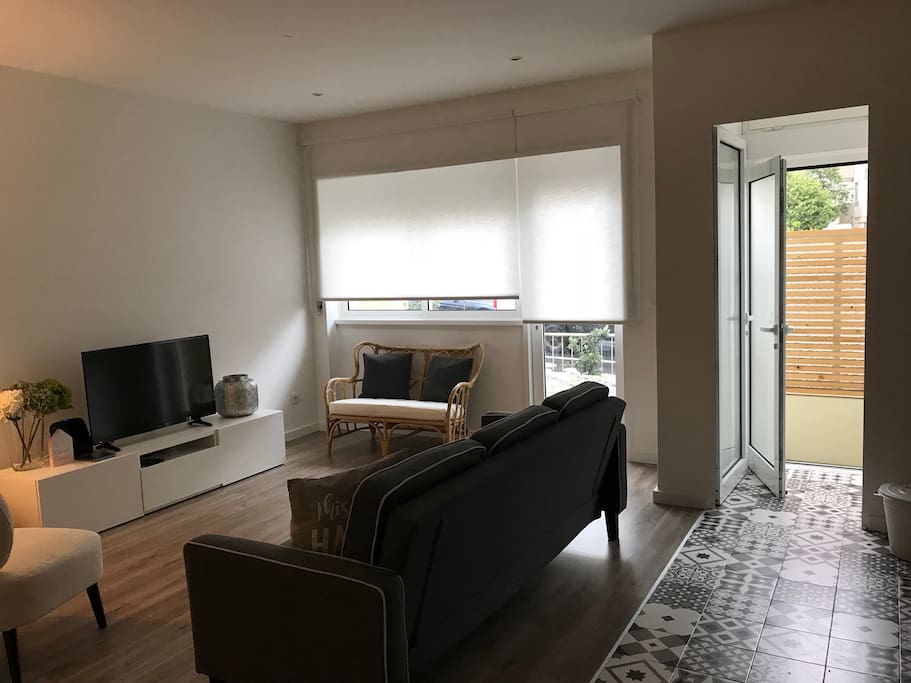 Sala de estar-jantar com acesso direto ao terraço