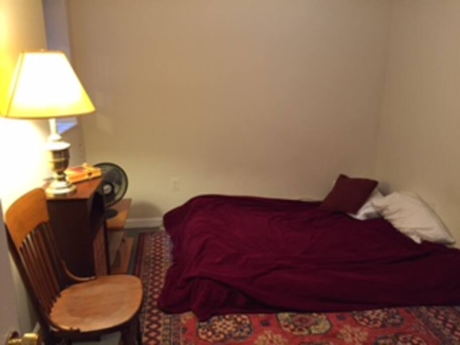 First bedroom, which has a bed that is on the floor. This is where I usually sleep. I keep the bed on the floor because I find that I sleep better.