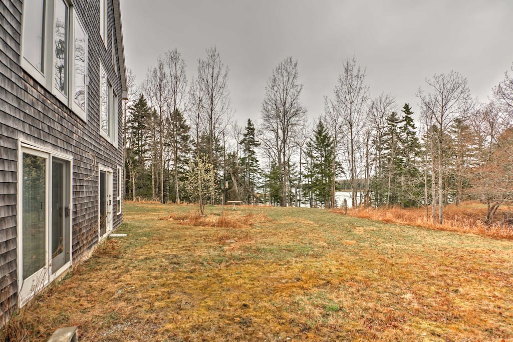 A large gully runs against the Jordan River on this home's 7-acre property.