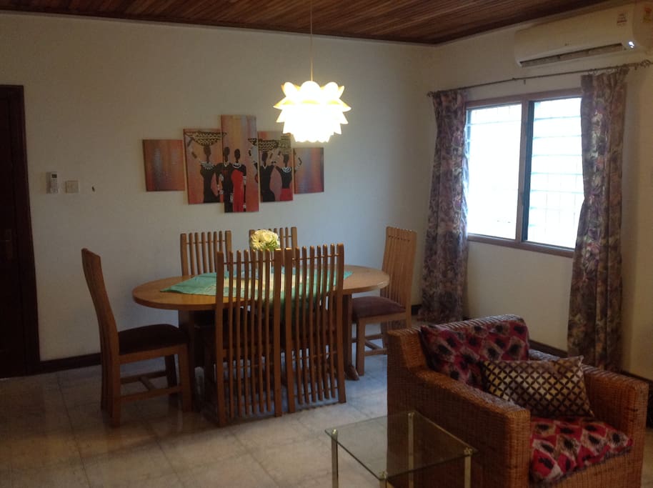 Dining area, Hall 2, with 6 seater dining set, wall painting, entertainment system, AC, etc.