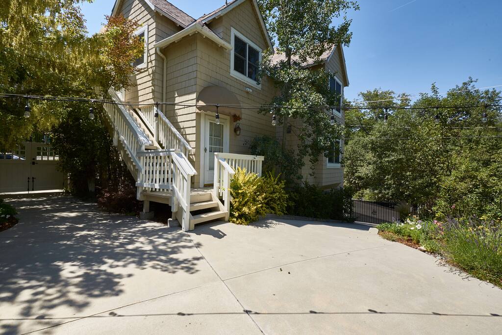 Private entrance to guest house is at the top of white stairs. Door in picture is the door to garage.