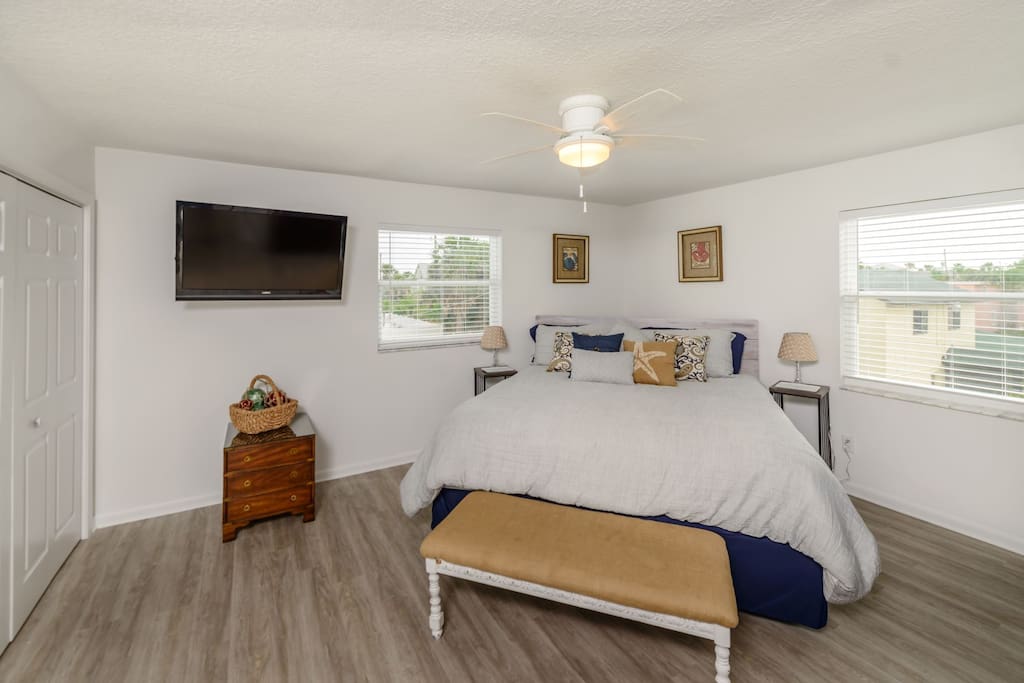 Master Bedroom with King Sized Bed and Large TV