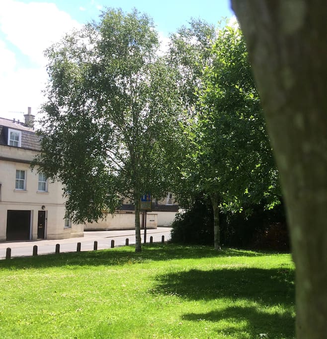 The house overlooks a quiet green leading to the river Avon.