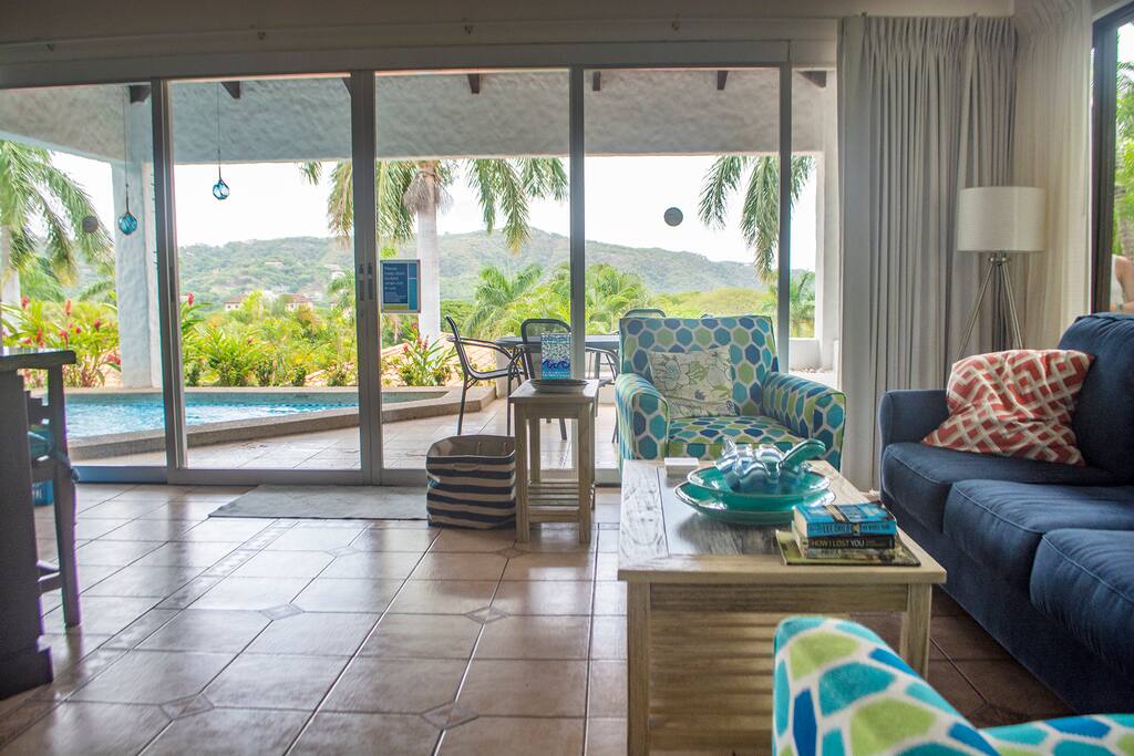 Living room, terrace and pool