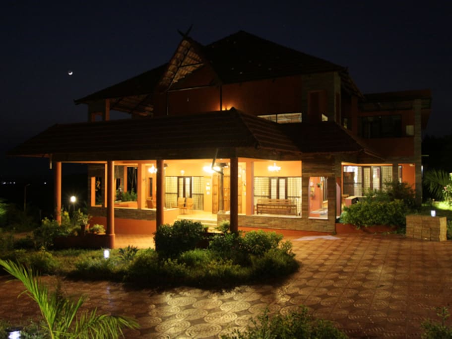 The Villa facade at night