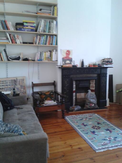 second bedroom/study with sofa couch that can sleep two