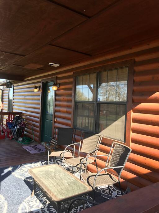 Relaxing front porch perfect for watching the sunset after a long day on the lake.