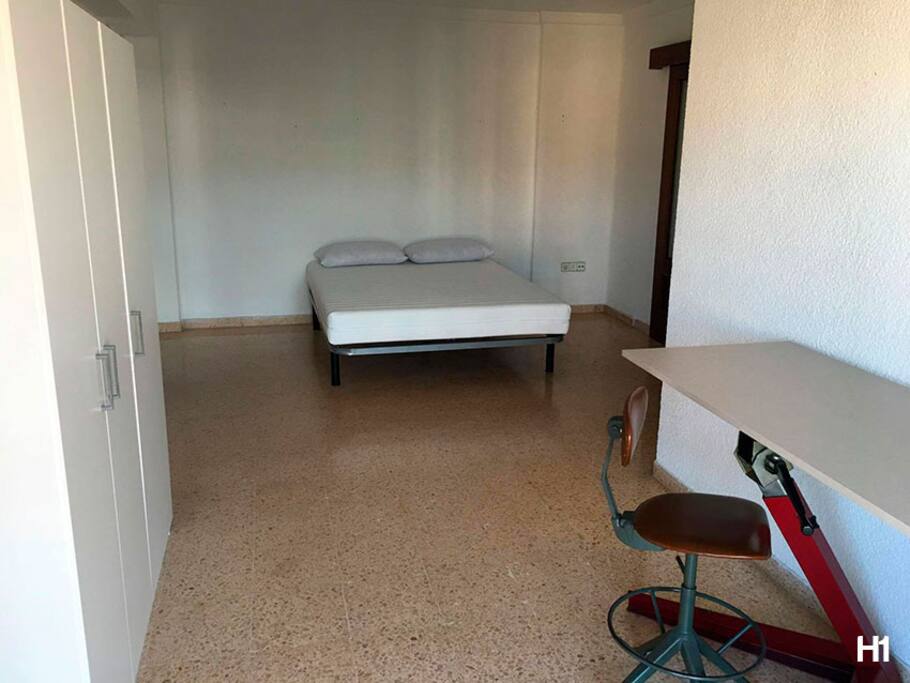 room1 with private balcony closet and desk