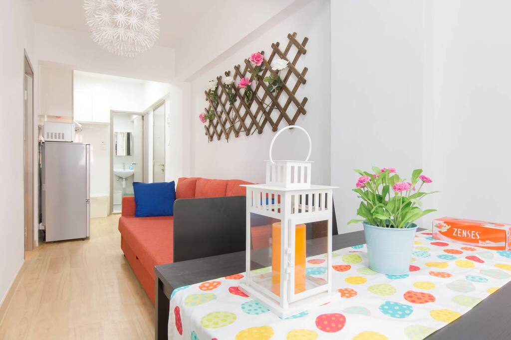 Rectangular shaped Living Room with lots of sunlight