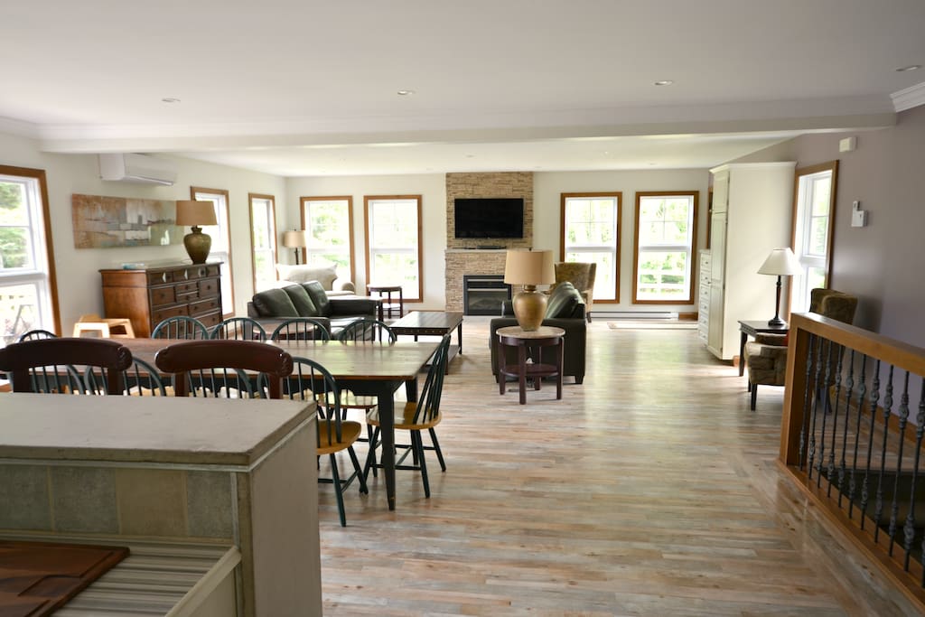 Upstairs living room with propane fireplace & TV.