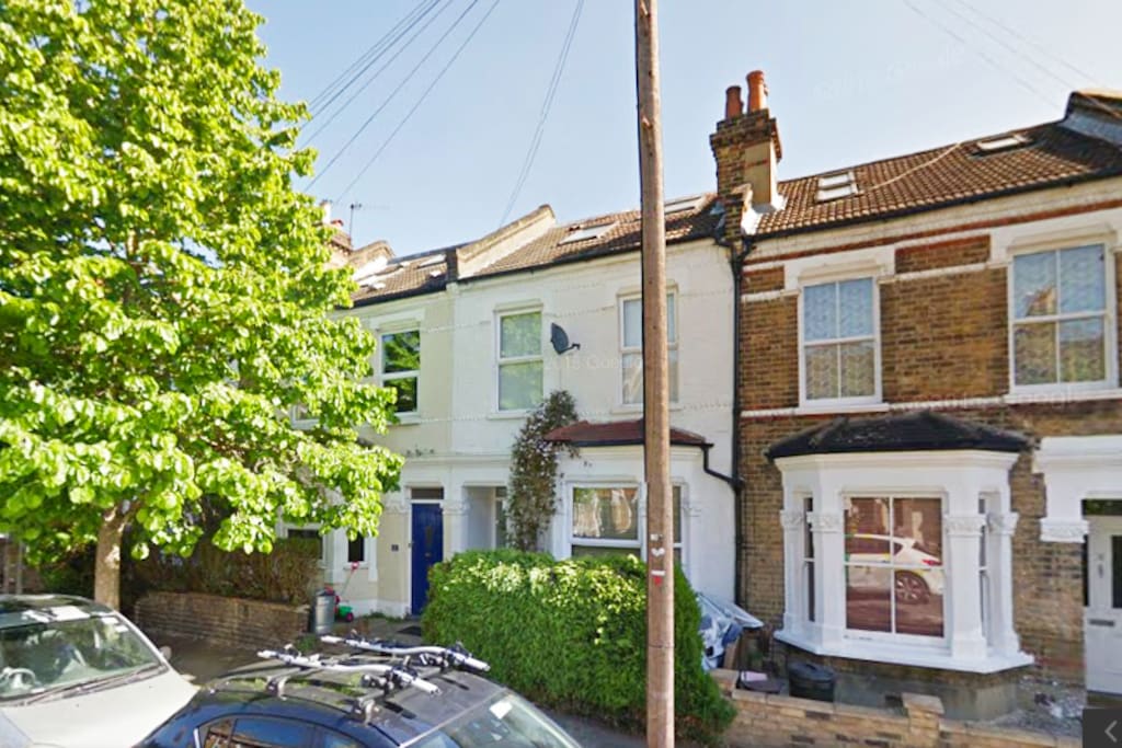 A delightful Victorian terraced house with marine blue door.