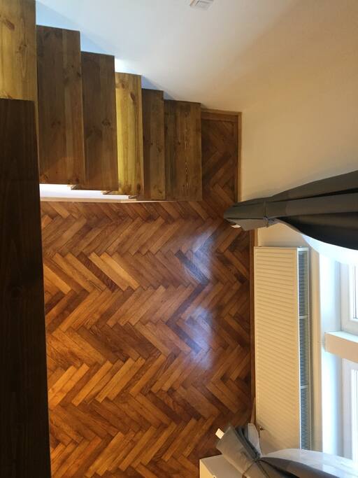 the stairway from the upper part of the bedroom