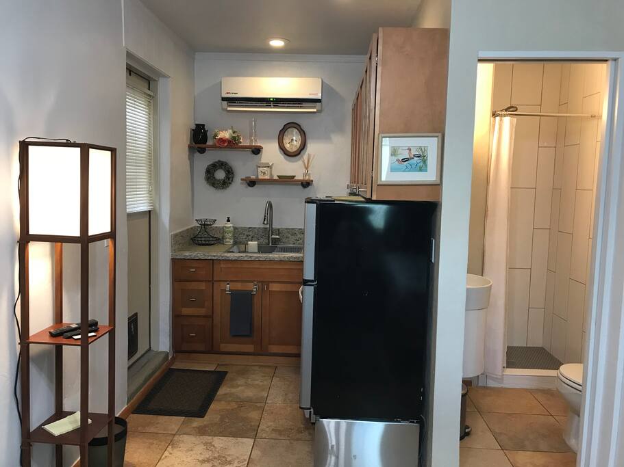 View of kitchen and into bathroom