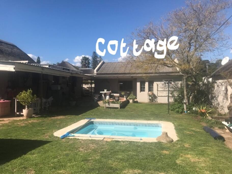 View of cottage and back of main house
