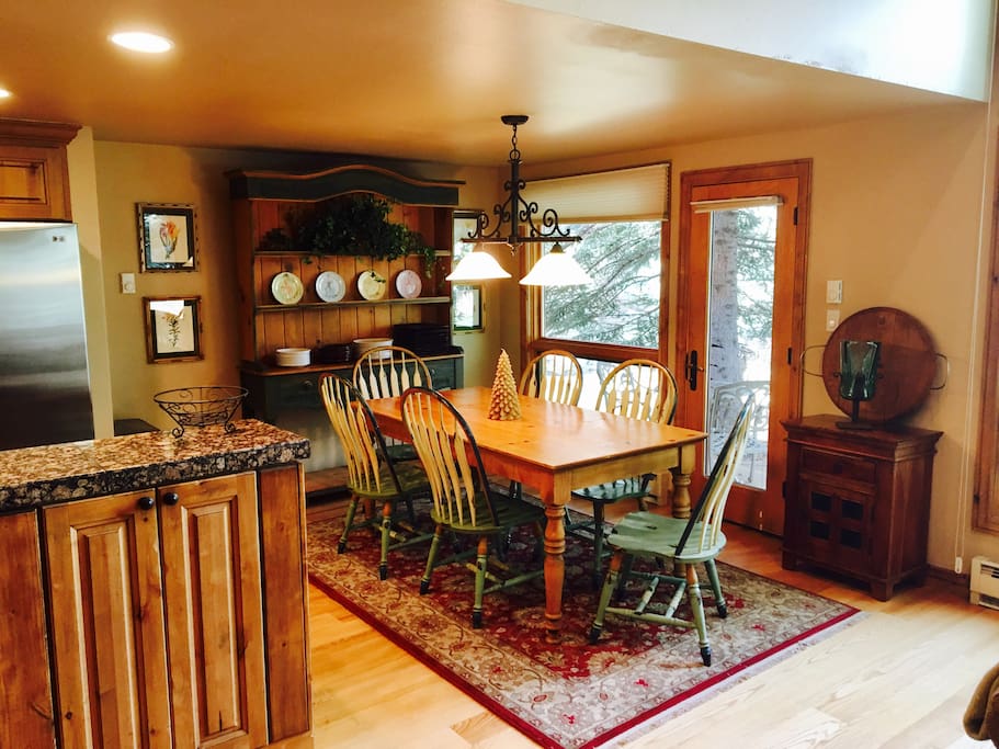 Kitchen and dining area open to private deck - perfect for BBQ or cocktails outside